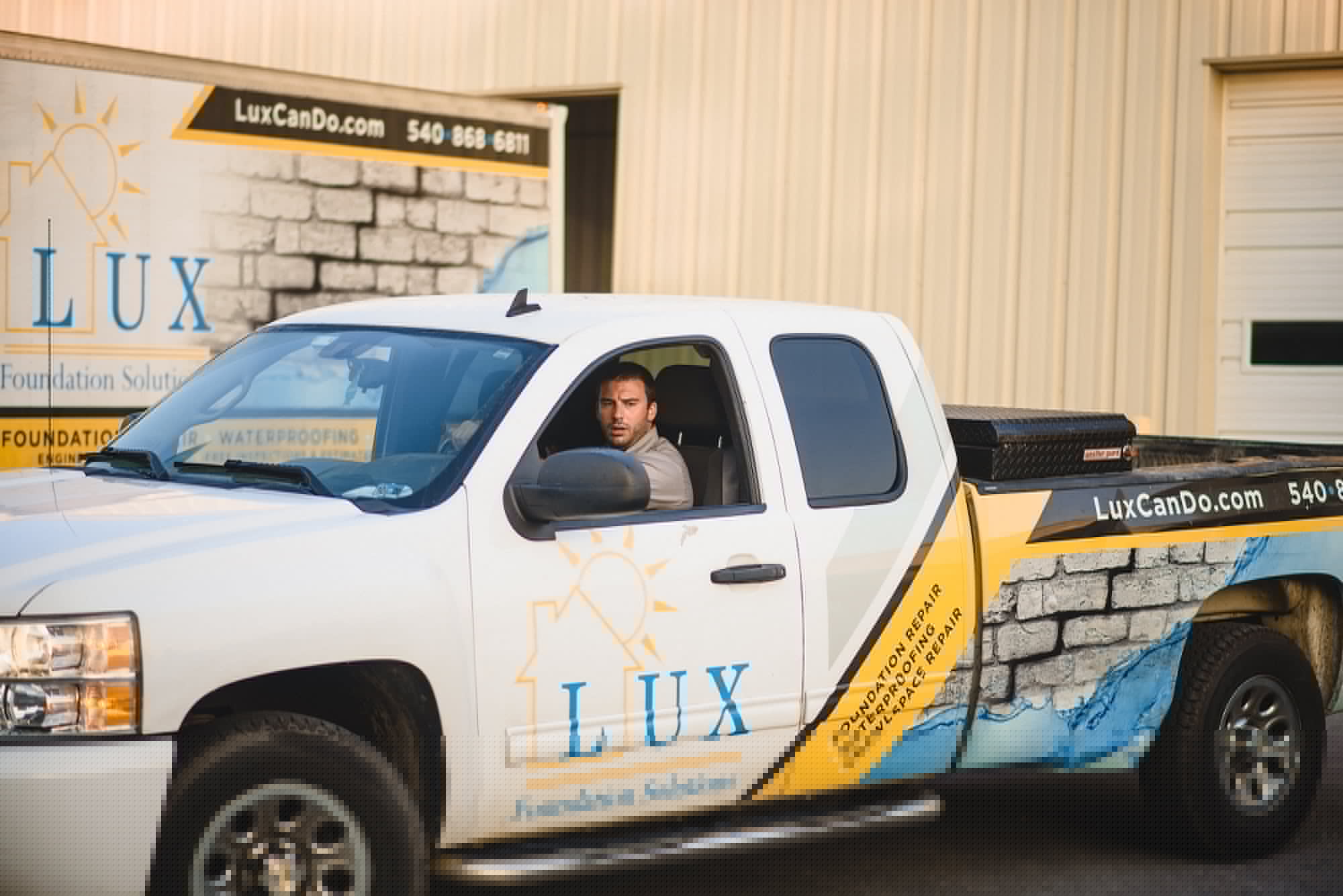 Experienced structural repair team preparing equipment for a job site